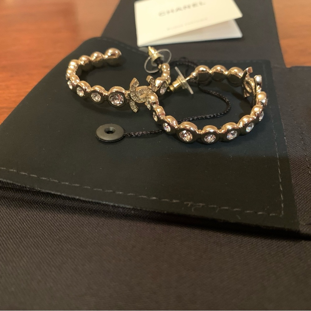 Absolutely stunning authentic Chanel hoops with cc logo, crystals . Must have!
